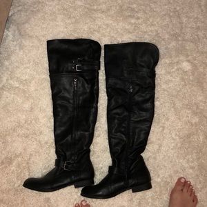 Over the knee flat boots